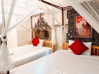 Camera Deluxe Doppia con Letti Singoli