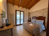 Camera Tripla con Vista Giardino