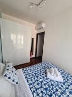 Blue Retreat Modern Apartment near M4 Milan - Chambres d’hôtes Milan