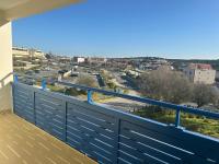 One-Bedroom Apartment with Balcony and City View