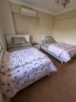 Brand New Luxurious 3 Rooms Garden view apartment - B&B New Cairo