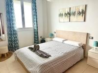 One-Bedroom Apartment with Balcony and Water View