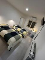 Camera Doppia con Letti Singoli con Bagno Privato 