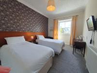 Tweepersoonskamer met 2 Aparte Bedden