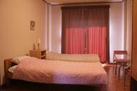 Chambre Lits Jumeaux avec Salle de Bains Commune