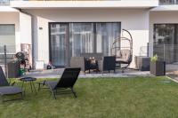 Apartament Ustka Holiday z sauną i ogrodem - Ferienwohnung Stolpmünde