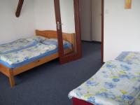 Kleine Tweepersoonskamer met 2 Aparte Bedden
