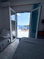 Scirocco Rooms - B&B Loutro