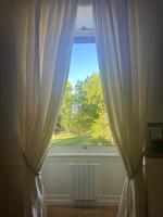 Kamer met Kingsize Bed en Uitzicht op de Tuin