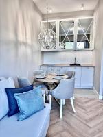 Apartament WHITE GLOVE Prestige Nad Zatoką jezioro Ukiel - Chambres d'hôtes Olsztyn