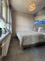 One-Bedroom Apartment with Balcony and Mountain View