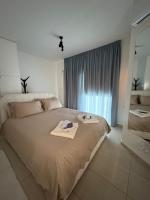 FLH - Feel Like Home Modern 1-Bedroom Ground floor Apartment in Strovolos - B&B Káto Lakatámeia