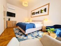 Kamer met Queensize Bed en Uitzicht op de Tuin