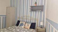 Tweepersoonskamer met Gedeelde Badkamer