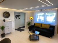 Design-Apartment mit privatem Spa-Feeling & Kino - Ferienwohnung Grub am Forst