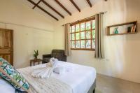 Villa Piňa dorada dependencia del hotel Casa Merlin - Chambres d’hôtes Puerto Viejo