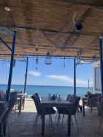 Delfini Pearl Stegna Beach - Chambres d’hôtes Archangelos