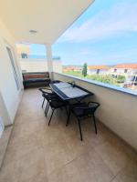 Two-Bedroom Apartment with Terrace and Sea View