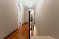 Appartamento di lusso su due livelli con cortile