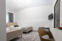 Camera Deluxe Doppia con Letti Singoli