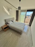 Two-Bedroom Apartment with Balcony and Sea View