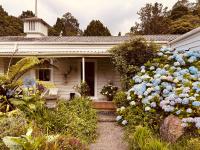 Kamer met Queensize Bed en Uitzicht op de Tuin