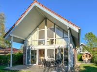Ferienhaus Wiesengeflüster E5 - gruppenfreundlich in Randlage mit Fasssauna - B&B Röbel