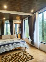 Zimmer mit Queensize-Bett und Gartenblick