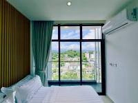 One-Bedroom Apartment with Balcony and City View