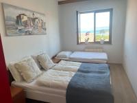 Two-Bedroom Apartment with Balcony and Sea View