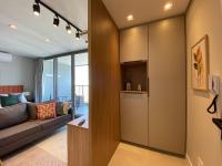 Estudios con piscina exterior en el salón. - B&B São Paulo