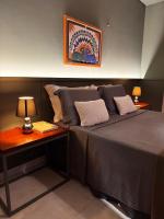 Descubra a Casa Felicidade em Belém! Climatizada, com sala ampla, 2 quartos, mezanino e Wi-Fi veloz. Localização central perto de atrações e gastronomia. Viva a Amazônia com conforto exclusivo. Reserve já sua experiência inesquecível! - B&B