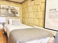 Camera Quadrupla con Bagno in Comune