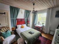 Eenpersoonskamer met Gedeelde Badkamer