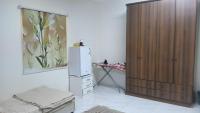 Cama en habitación femenina compartida de 4 camas