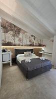Kamer met Queensize Bed en Balkon