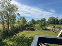 Rosenhaus Esens - Wohnung Backbord - B&B Esens