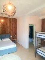 Chambre Quadruple avec Salle de Bains Privative