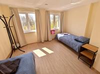Standaard Tweepersoonskamer met 2 Aparte Bedden - Gedeelde Badkamer