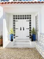 Vila Golfinho, with heated pool, rooftop lounge and ocean views - B&B Senhora da Luz