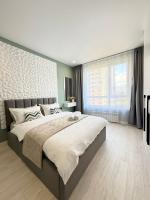 Двухкомнатная квартира с дизайнерским интерьером и видом на горы - Bed and Breakfast Almaty