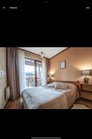 Forest nest Cozy apartment white balcony on the hill - B&B Bansko