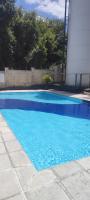 Apartamento bem localizado - Chambres d’hôtes