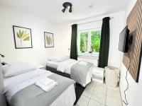 LTA Apartment Ingolstadt Irgertsheim-5 Schlafzimmer-Einzelbetten-WLAN-Waschmaschine - Chambres d'hôtes Ingolstadt