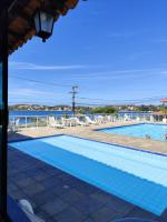 TOP 1 QUARTO com ESTACIONAMENTO em Condomínio com VISTA INCRIVEL - PORTARIA 24h, PISCINA, Sauna e Parquinho Infantil - Apartamento com Ar condicionado, Smart TV, Wi-Fi, Cozinha Completa, NETFLIX, Entre o MAR e a LAGOA, CUSTO BENEFICIO - B&B São Pedro da Aldeia