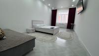 Уютная кв в ЖК Satym мкр Батыс-2 - B&B
