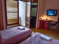 Camera Doppia con Letti Singoli con Bagno