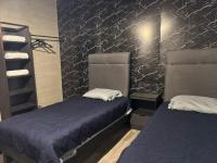 Basic Dreibettzimmer mit Gemeinschaftsbad