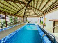 Lagoon Luxe 4BHK Luxury Terrace Pool Villa with Private Theatre & Pool Table by Spacez - Chambres d'hôtes Bangalore