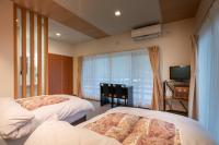 Tweepersoonskamer met 2 Aparte Bedden